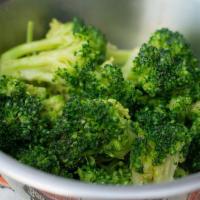 Steamed Broccoli  · Fresh cut broccoli steamed with butter.