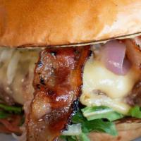 Bistro Burger* · Gouda cheese, applewood smoked bacon, grilled onions, arugula &  chipotle avocado crema