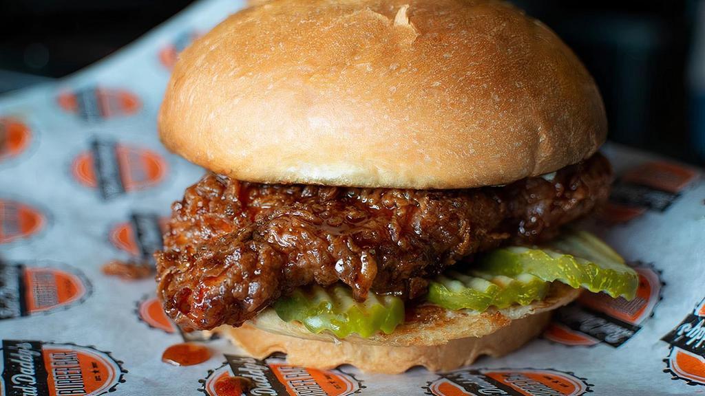 Kim'S Honey Chicken · Our Buttermilk fried chicken breast with a spiced honey sauce, pickles and our house jalapeno ranch.