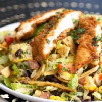 Texican Chicken Salad · Romaine lettuce, buttermilk-fried chicken breast, cilantro, red onion, tomato, black beans, ...