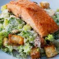 Charlotte'S Salmon Caesar Salad · Salmon Fillet, Romaine Lettuce, Caesar dressing, croutons & Parmesan cheese
