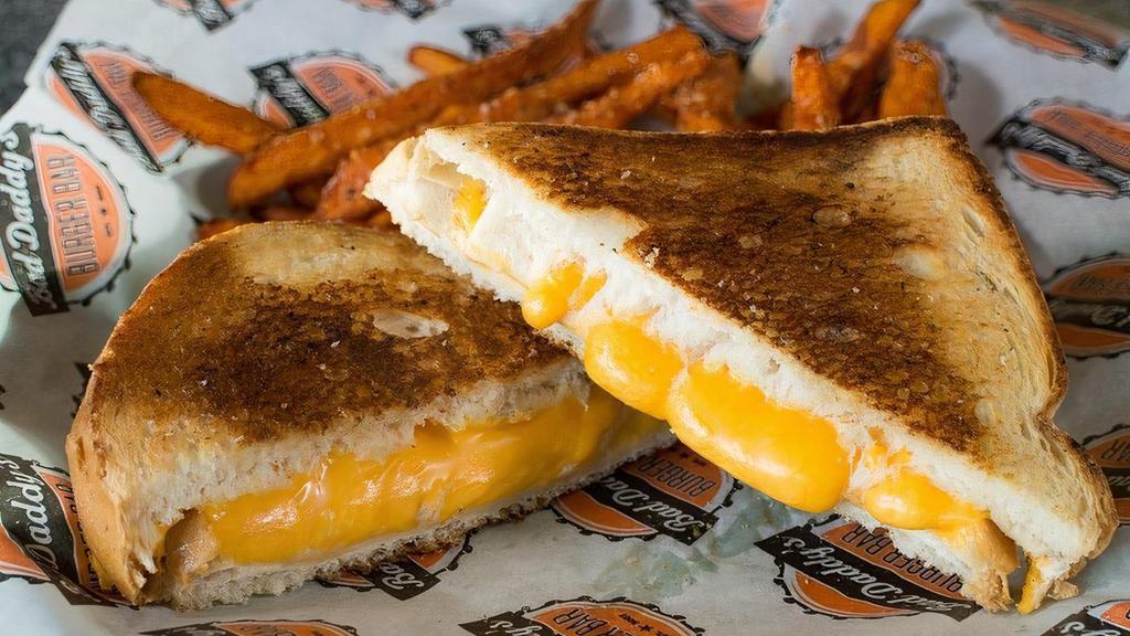 Kids Grilled Cheese  · Buttered Texas Toast with melted American cheese and choice of side and drink