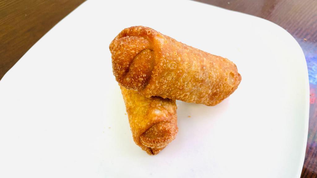 Egg Roll · Stuffed with pork, cabbage and carrot in a crispy yellow shell.