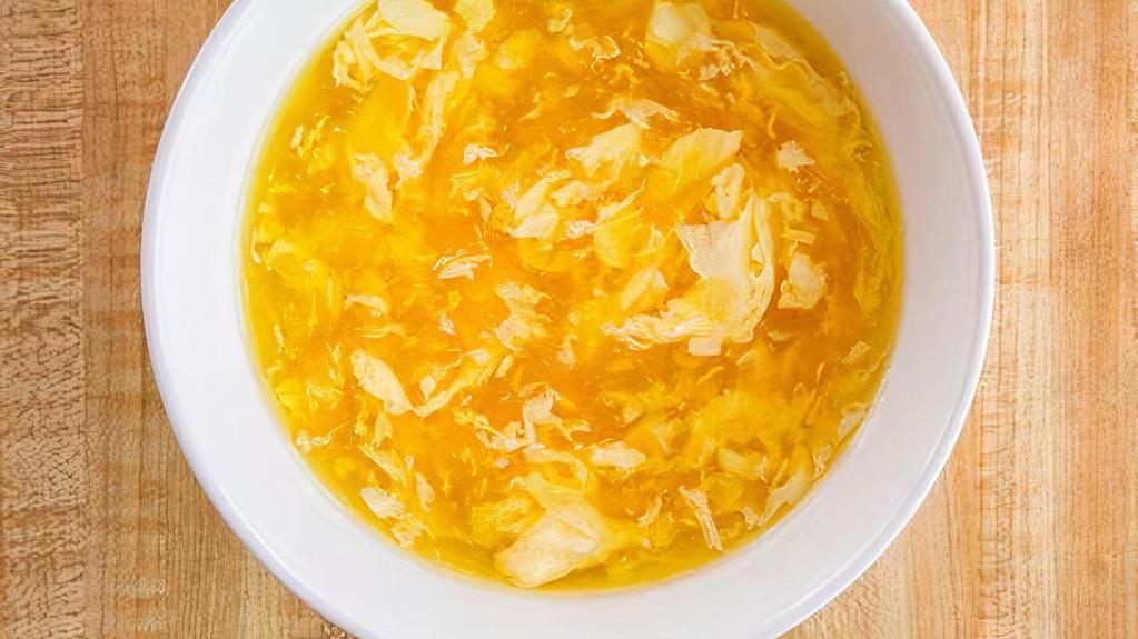 Egg Drop Soup · Thick soup with scrambled egg that is served with crispy noodles.