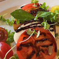 Caprese · Sliced mozzarella di bufala, organic heirloom tomatoes, glazed balsamic vinegar, olive oil, ...