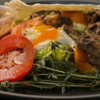Jerk Veggie Burrito · Jerked eggplant,vegan crumbles ,beans, potato,lettuce tomato with Fya Mikah sauce be BRAVE t...