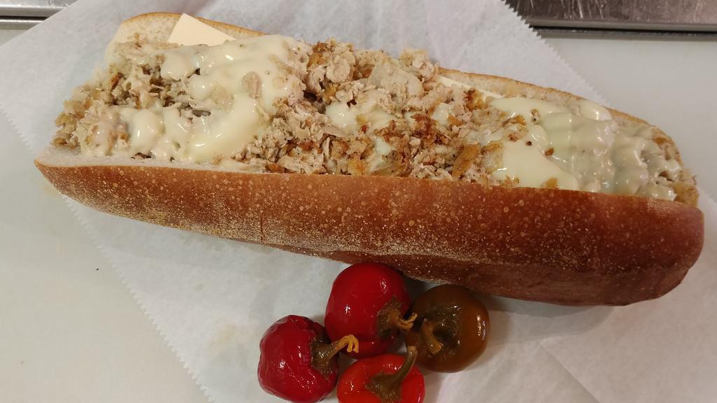 Chicken Cheese Steak · 100% All Natural White Meat, Seasoned and grilled to perfection, melted White American Cheese. On a Toasted Steak roll. Prepared Meat, Cheese and Bread. You finish it.