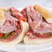 The Original Italian Hoagie · Provolone Cheese, Thinly sliced & piled high Genoa Salami, Spicy Capicola, Baked Ham, L.T.O....