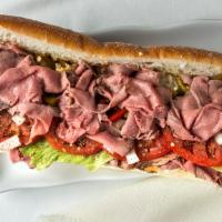 Roast Beef Hoagie · 100% All Natural Medium Rare Top Round, thinly sliced piled high with your choice of cheese,...