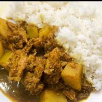 Curry Goat · served with Rice