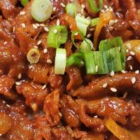 Spicy Pork Rice Bowl · Korean Spicy Pork served w/ white rice, green onions, sesame seeds, and Yummy Sauce on the s...