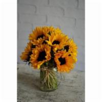 Rustic Radiance · Sunflowers are the brightest and most cheerful of flowers. When they are gathered in a mason...