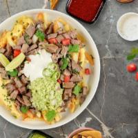 Holy Jalapeno Asada Fries  · (Vegetarian) Sour cream, melted cheese, guacamole, cilantro, grilled onions, grilled jalapen...