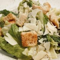 Caes-Art Salad · Our classic Caesar salad served shaken, not stirred with the original Caesar cardini dressing.
