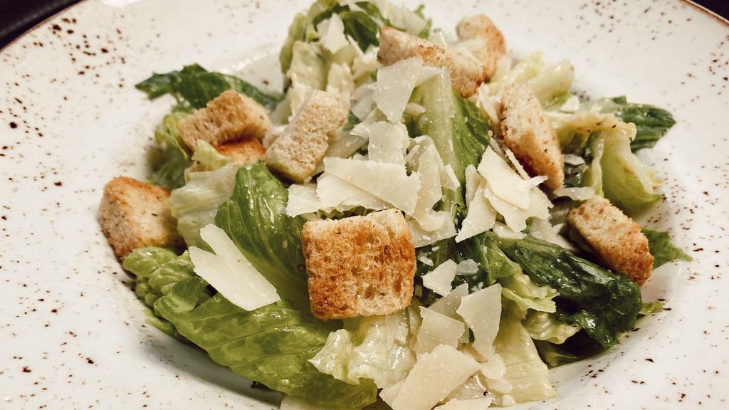 Caes-Art Salad · Our classic Caesar salad served shaken, not stirred with the original Caesar cardini dressing.