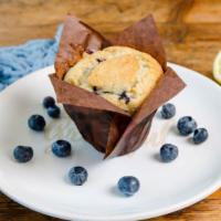 Jumbo Blueberry Lemon Muffin · Beth's Collosal Blueberry Muffin bursting with fresh lemon zest.