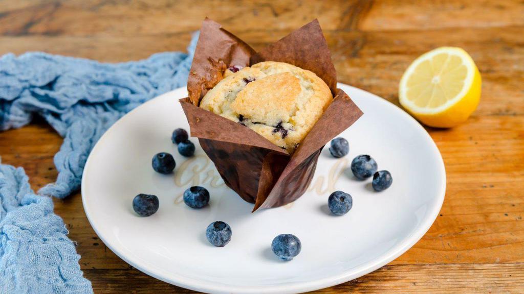 Jumbo Blueberry Lemon Muffin · Beth's Collosal Blueberry Muffin bursting with fresh lemon zest.