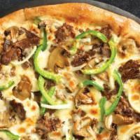 Crispy Thin Philly Pizza · Melty white cheese sauce piled high with tender shaved steak, marinated mushrooms, freshly s...