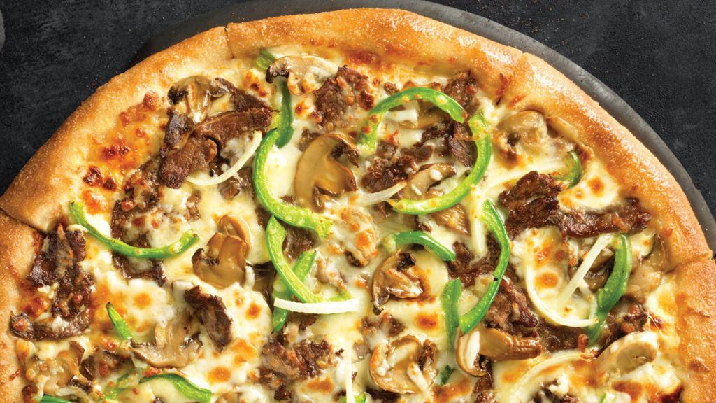 Crispy Thin Philly Pizza · Melty white cheese sauce piled high with tender shaved steak, marinated mushrooms, freshly sliced green peppers and onions and our three fresh signature cheeses
