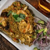 Apatado De Mariscos A La Chiclayana · Northern Peruvian style green seafood rice, made from yellow pepper, cilantro base, and chic...