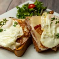 Open Face Breakfast Sandwich · brioche bread, ham, swiss, fried eggs*, bacon & aioli.