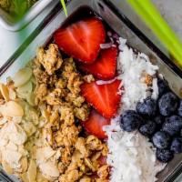 Acai Bowl · Granola, coconut flakes, blueberries, banana, strawberries, and almonds.
