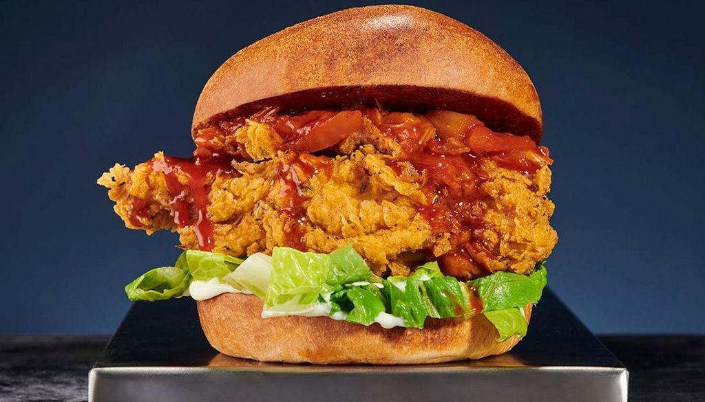 Chilli Bang Chicken Sandwich 🌶 · Crispy hand-breaded fried chicken burger with chilli bang hot sauce, spicy mayo, lettuce and fresh slaw.