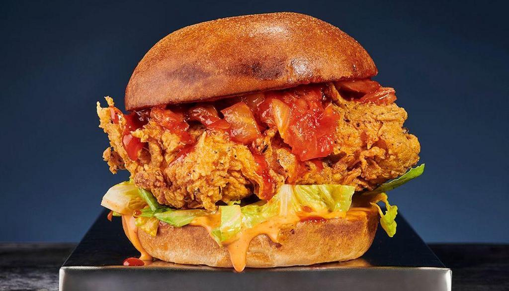 Golden Sriracha Chicken Sandwich  · Crispy hand-breaded fried chicken burger with sweet and spicy golden sriracha sauce, spicy mayo and lettuce.