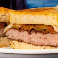 Beef Patty Melt · Grilled burger topped with chipotle mayo, caramelized onions and Swiss cheese on grilled rye.