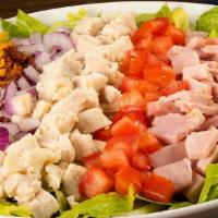 Toojay'S Cobb Salad · Fresh romaine piled high with diced chicken breast, ham, red onions, crumbled bacon, tomatoe...