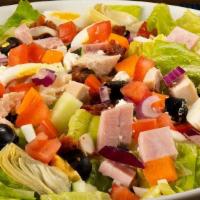 Toojay'S Chopped Salad · Turkey, ham, egg, black olives, red onions, fresh romaine and garden vegetables tossed with ...