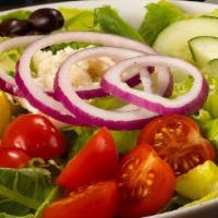 Greek Salad · Lots of Feta cheese, Greek olives, tomatoes, onions, cucumbers and pepperoncini on a bed of ...