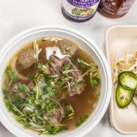 P3 Pho Bo Vien  · Beef Broth simmered for 24 hours served with rice noodles and Vietnamese meat balls.