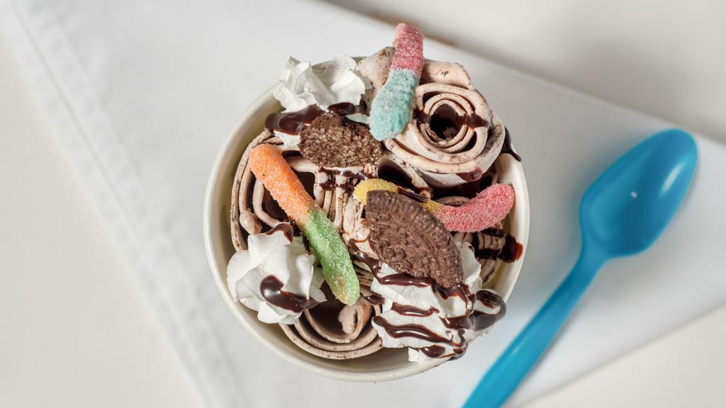 Mud Pie · Chocolate ice cream, oreo crumbs, gummy worms, and whipped cream.