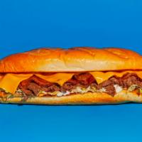 Bacon Ranch Cheesesteak · Sliced steak with melted white American cheese, crispy bacon, and creamy ranch on a hoagie r...