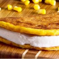 Cheese Cachapa · sweet corn dough with mano cheese, butter, shredded cheese & nata