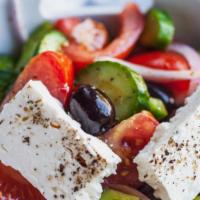 Greek Salad  · Lettuce, onion, tomato, kalamata olive, cucumber, feta cheese, olive oil & lime dresing