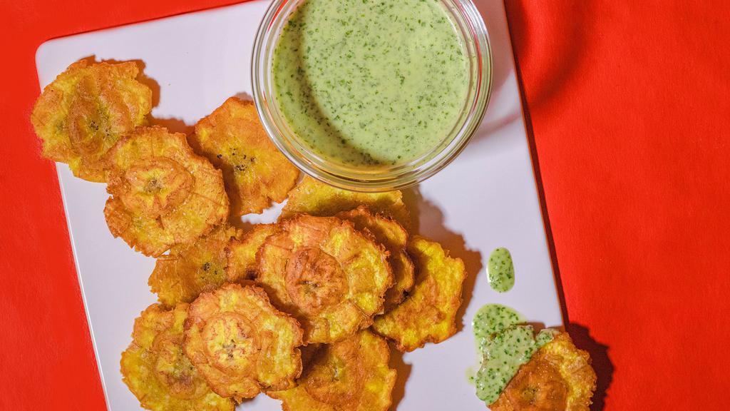 Tostones · 4 pieces of tostones whit cheese and tartara sauce