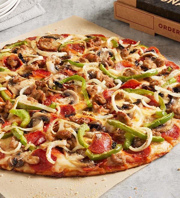 Works (Individual) · Heritage pepperoni, family recipe sausage, freshly cut green peppers and yellow onions, fresh mushrooms, Romano.