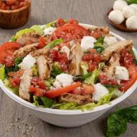 Chicken Caprese Salad (Party) · Chicken breast, fresh mozzarella, Roma tomatoes, tomato bruschetta, Romano. Served with Bals...