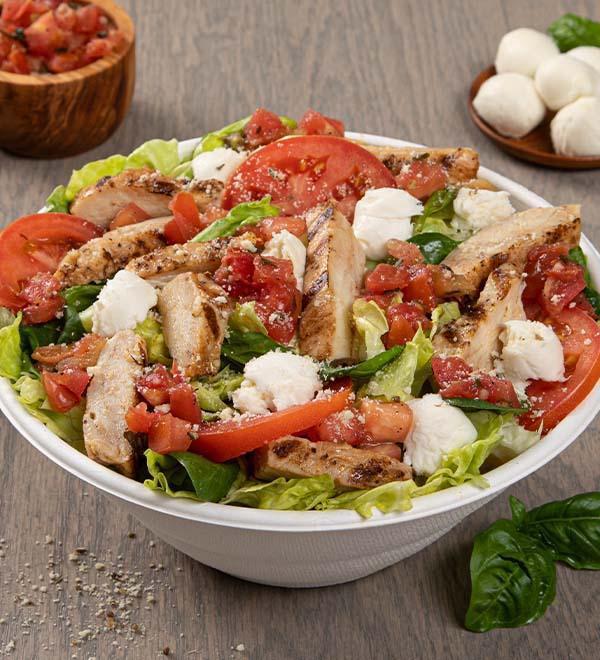 Chicken Caprese Salad (Entree) · Chicken breast, fresh mozzarella, Roma tomatoes, tomato bruschetta, Romano. Served with Balsamic Vinaigrette.
