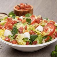 Caprese Side Salad · Freshly cut Roma tomatoes, fresh mozzarella cheese, tomato bruschetta, Romano. Served with B...