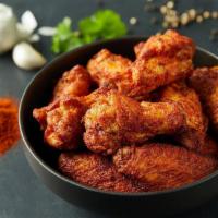 Traditional Wings (Party) · Chicken wings hand-spun with your choice of Signature Donatos wing sauce or dry rub.