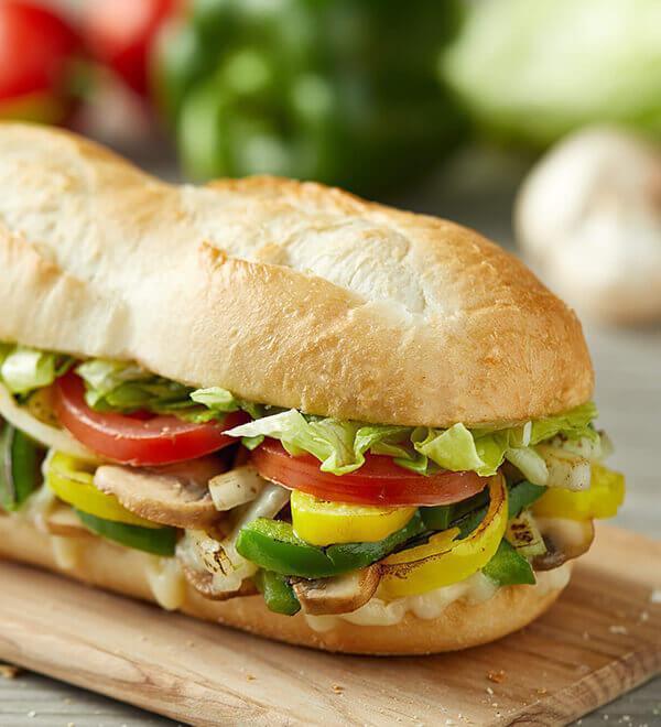 Fresh Vegy · Freshly cut Roma tomatoes, green peppers and yellow onions, fresh mushrooms and baby spinach, green olives, smoked Provolone, Romano.