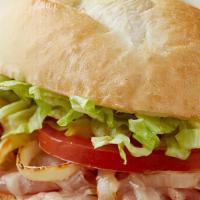 Ham And Smoked Provolone · Shaved ham, smoked Provolone, lettuce, freshly cut Roma tomatoes and yellow onions, house It...