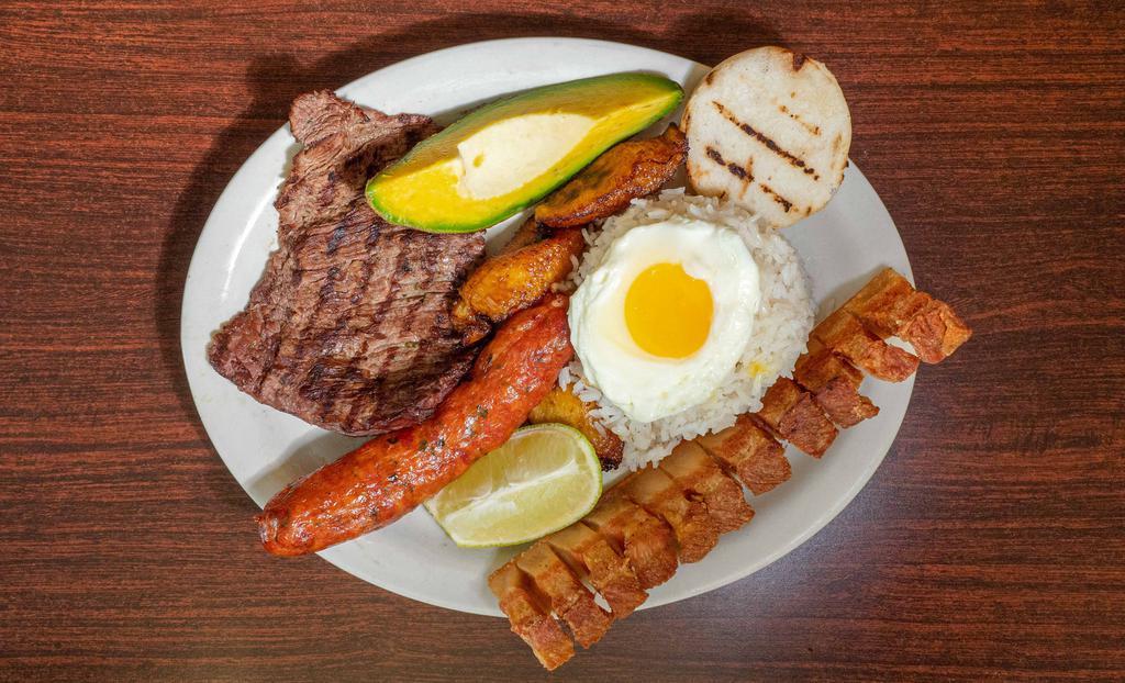 Bandeja Paisa · Colombian platter. Served with a side salad.