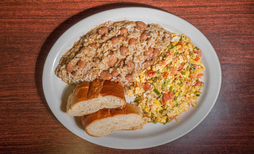 Calentado · Rice mixed with beans and eggs. Served with bread.