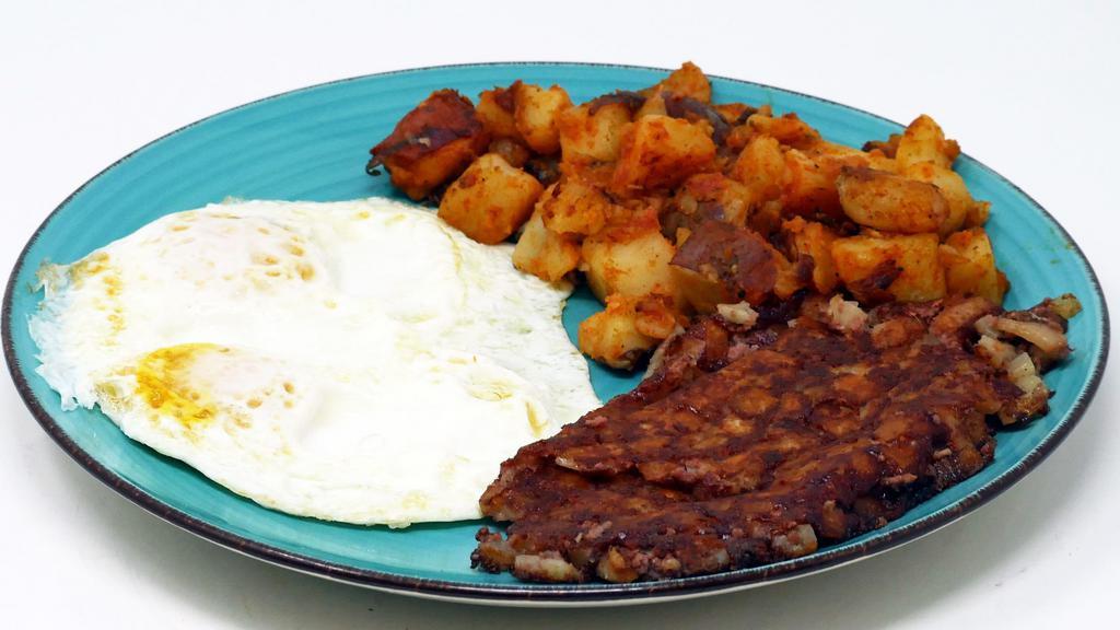 2 Eggs And Corned Beef Hash · *Consuming raw or undercooked meats, poultry, seafood, shellfish or eggs may increase your risk of foodborne illness, especially if you have certain medical conditions.