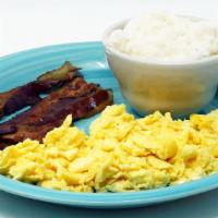 2 Eggs And Bacon · Served with home fries or grits and toast or biscuits.

*Consuming raw or undercooked meats,...