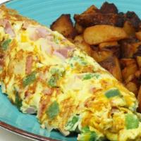 Western Omelette · A 3 Egg Omelette with diced Ham, Green Peppers, Onions.